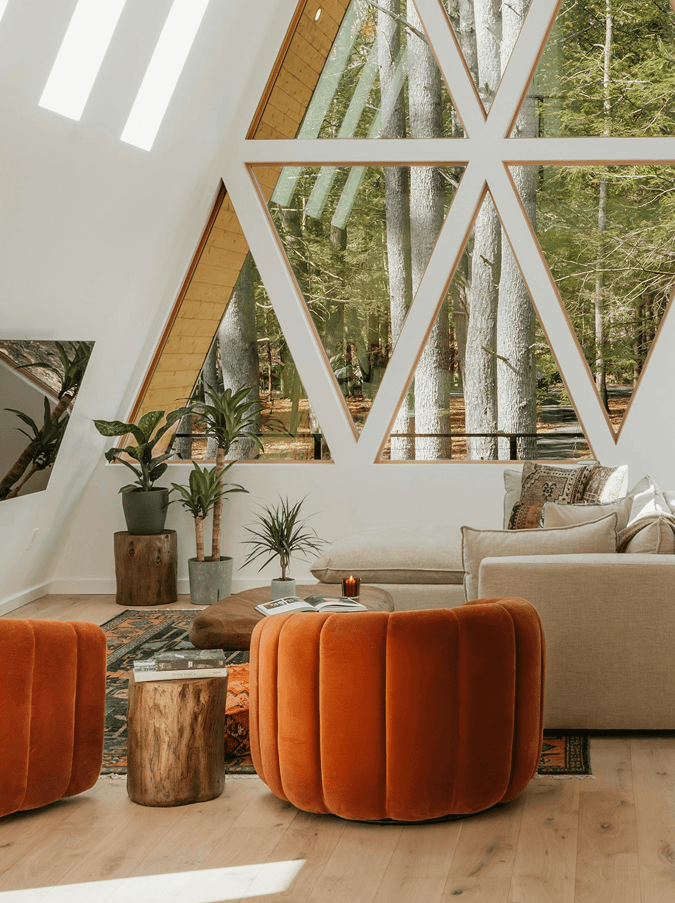 Stylish living room with orange chairs