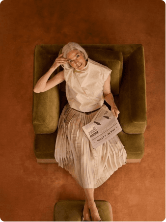Woman relaxing in stylish chair